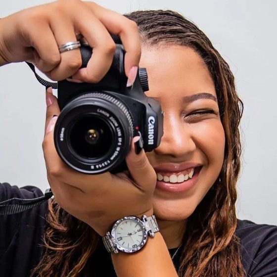Photographer holding a camera